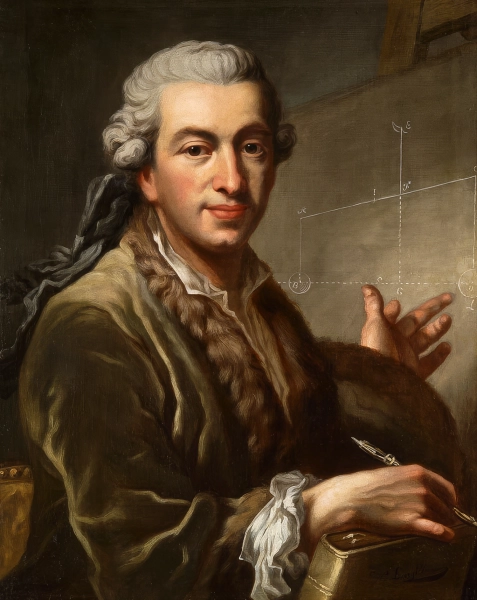 Мужчина в парике стоит перед доской.