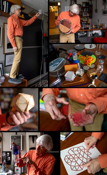 Нагель играет с разнообразными игрушками в своем офисе.