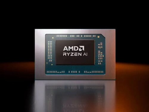 Чип AMD Ryzen AI на черно-оранжевом фоне.