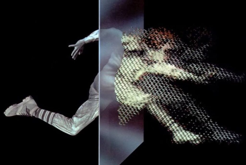 AGI ближе, чем кажется: Google Titans и бесконечная память Кажется,... 1 Человек прыгает через экран, слияние цифрового и физического, черный фон.