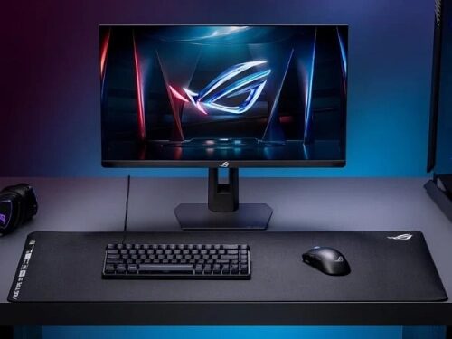 Игровой компьютер ASUS ROG: монитор, клавиатура, мышь на стильном фоне.