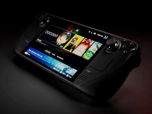 Портативная игровая консоль с экраном, черный фон.