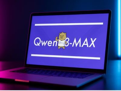 Ноутбук с открытым экраном, на котором показано название "Qwen 3-MAX" и изображение медведя.