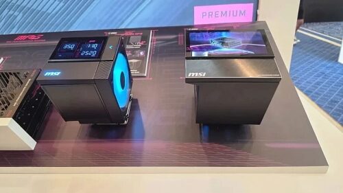 Процессоры MSI с дисплеем и системой охлаждения на выставочном стенде.