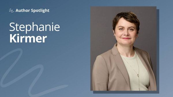 Портрет женщины в деловом костюме на фоне текста "Author Spotlight".