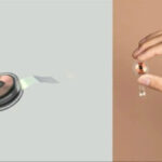 Круглое устройство Neuralink в руке, минималистичный дизайн.