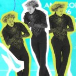 Танцоры в черных костюмах на ярком фоне с эффектом калейдоскопа.