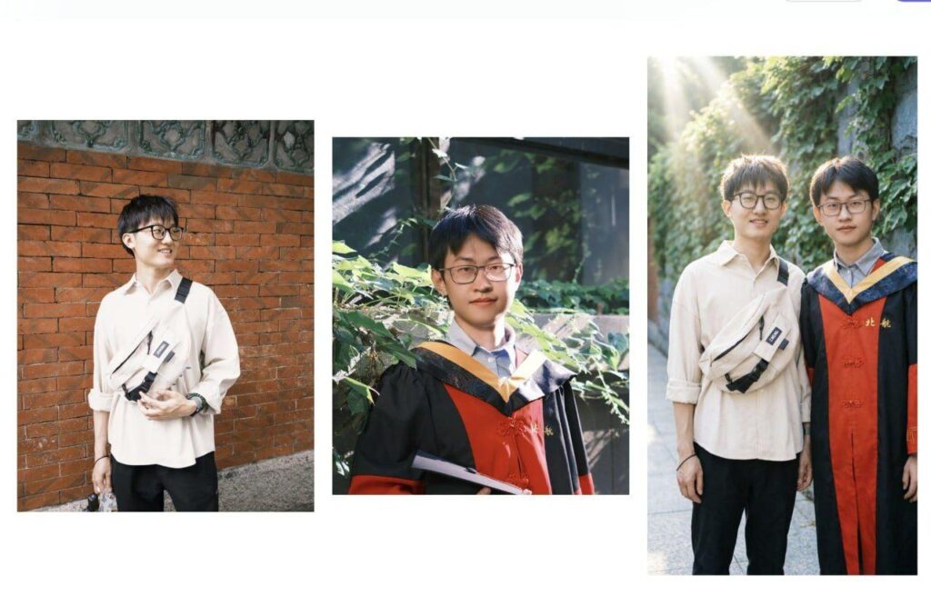 Выпускник университета с дипломом на фоне зелени и кирпичной стены.