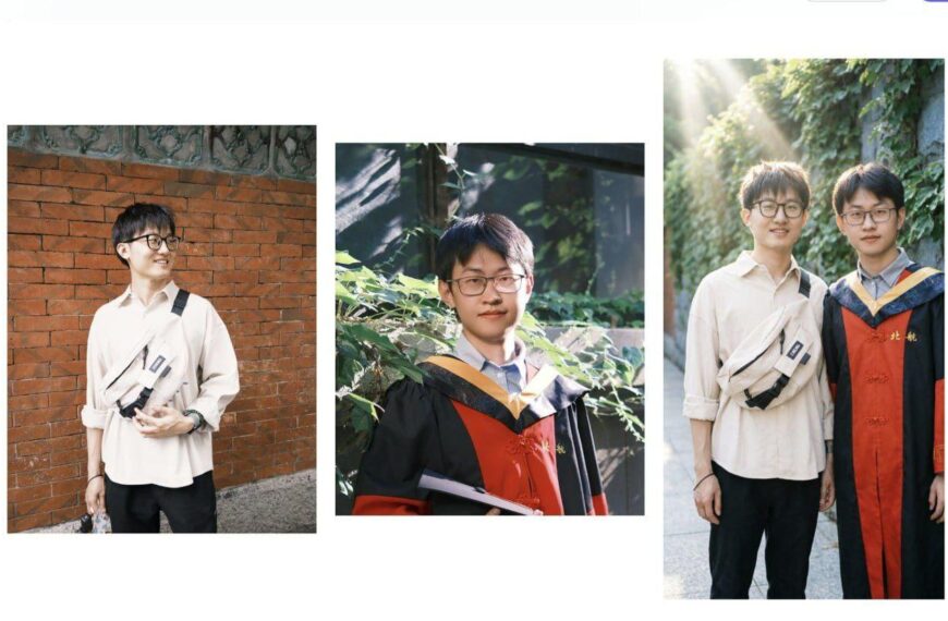 Выпускник университета с дипломом на фоне зелени и кирпичной стены.