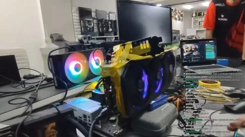 GeForce RTX 5070 Ti без собственной системы питания установила рекорд производительности 3 Сборка компьютера с RGB-вентиляторами и открытым корпусом на рабочем столе.