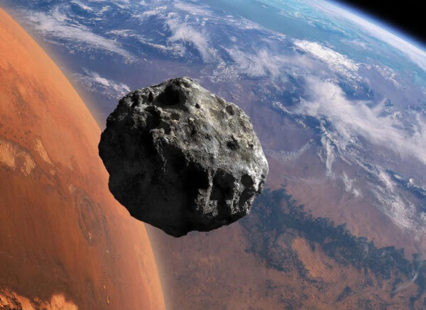 Астероид пролетает рядом с планетой среди космических просторов.