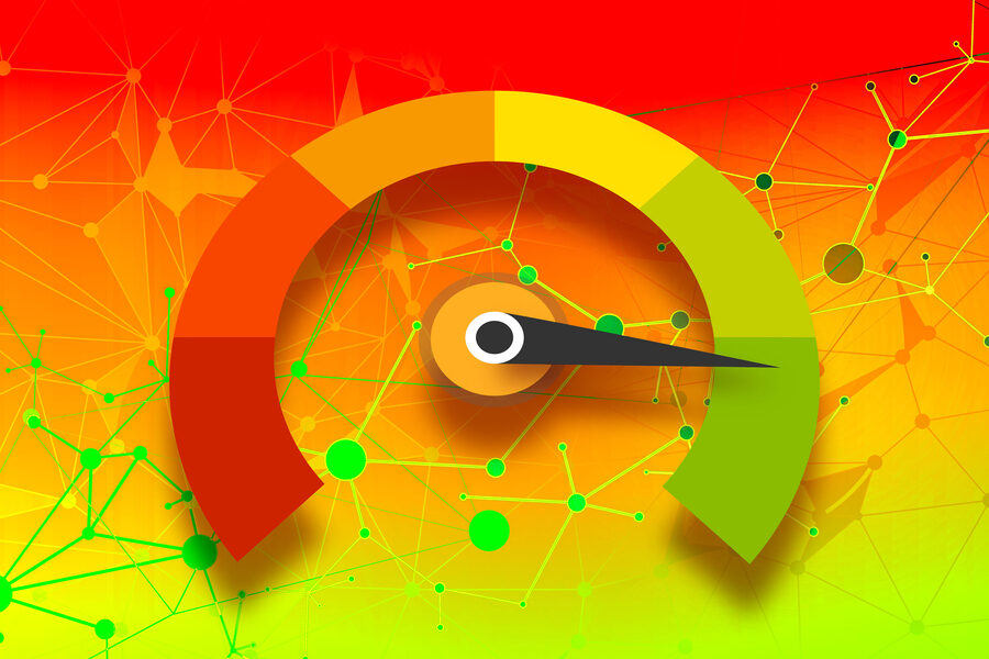 Шкала скорости на красно-зеленом фоне, со стрелкой, указывающей на желтую зону.