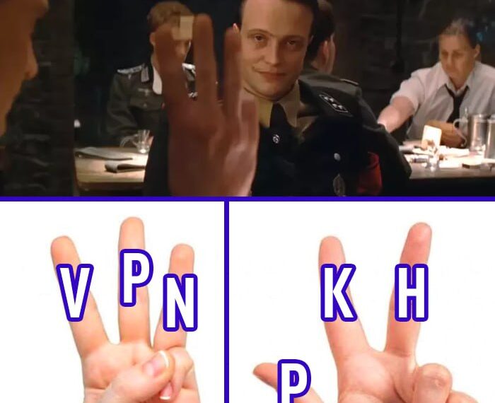 Сцена с жестами пальцами, где один жест символизирует "VPN", а другой "KHP".