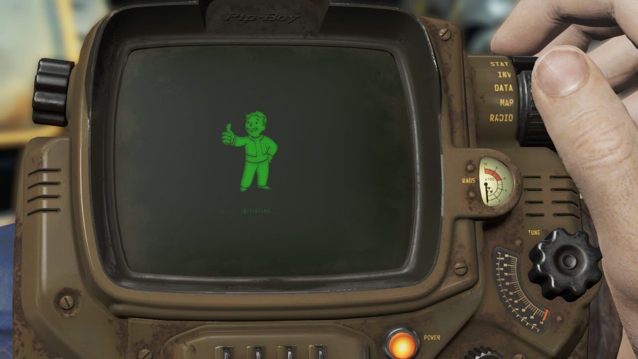 Экран Pip-Boy с изображением персонажа, показывающего жест "все окей".
