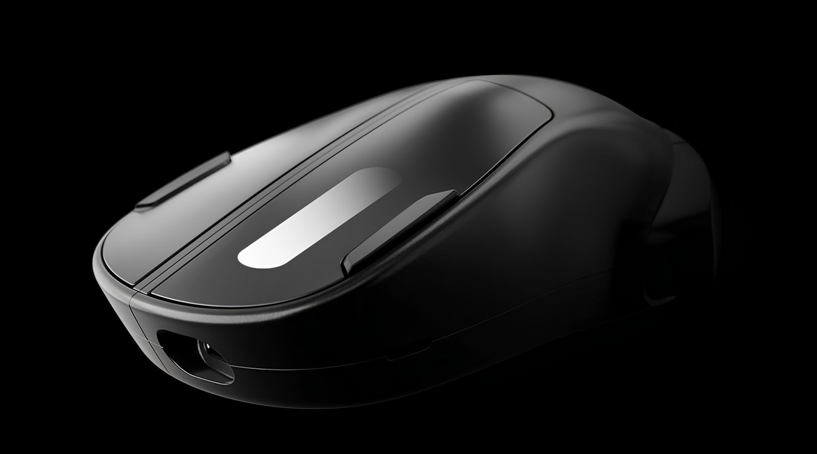 Чёрная беспроводная мышь на темном фоне, вид сбоку, минималистичный дизайн.