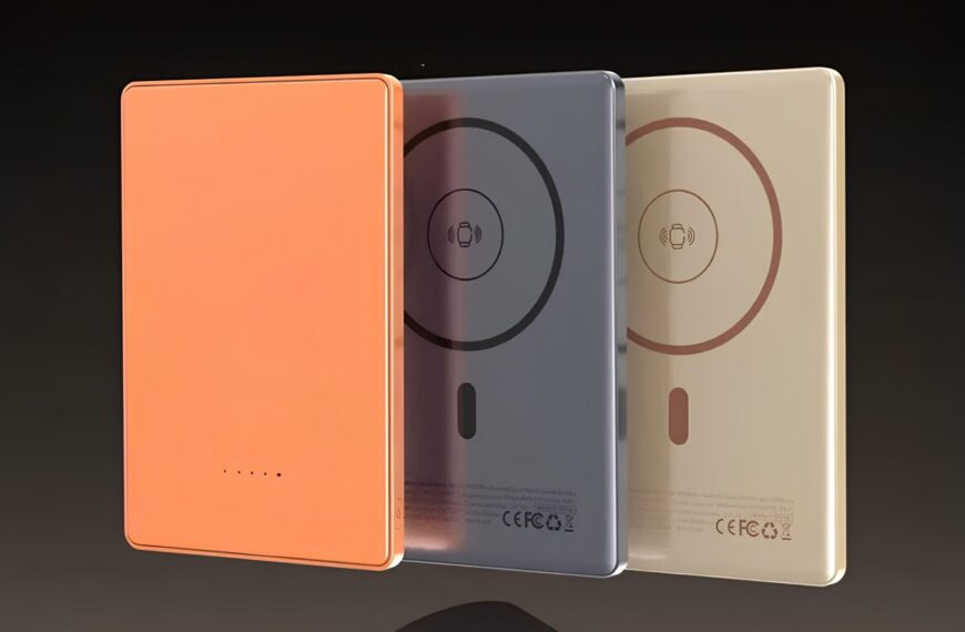 Три беспроводные зарядные батареи разного цвета на темном фоне.