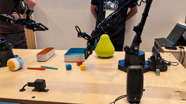 CoRL 2025. Стенд с роботом ALOHA от Gemini Robotics. CoRL 2025. Стенд с роботом ALOHA от Gemini Robotics.