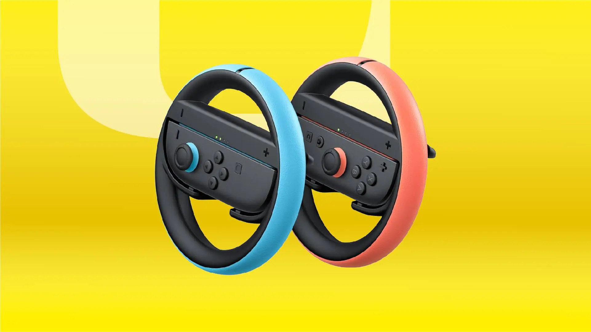 Два контроллера Joy-Con в виде руля на жёлтом фоне CNET.